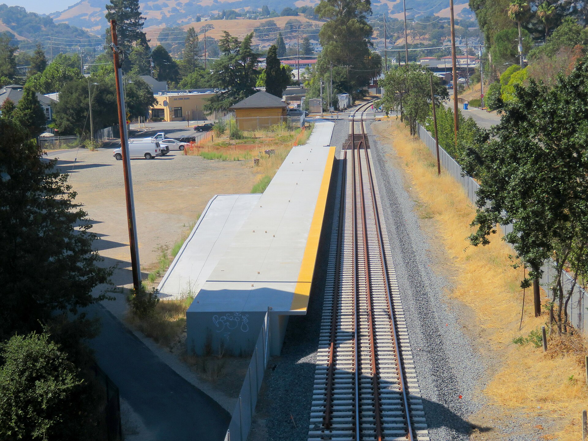 SMART rail platform in downtown Novato with Mount Burdell hills beyond